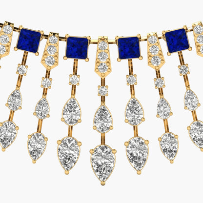 Gold necklace with blue and clear gemstones on a white background