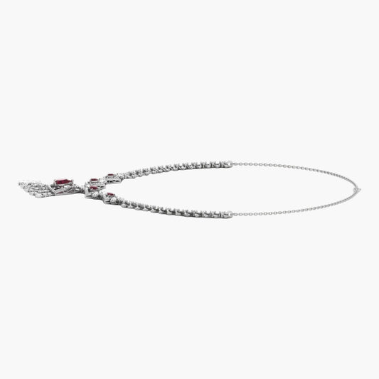 Silver necklace with a red gemstone on a white background