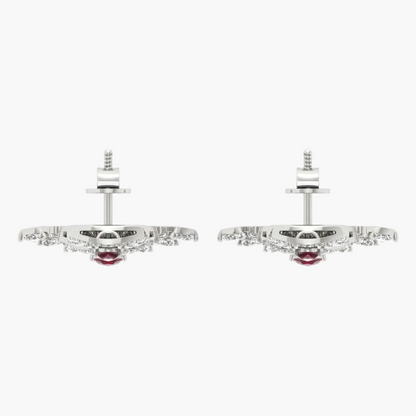 Pair of ornate earrings on a white background