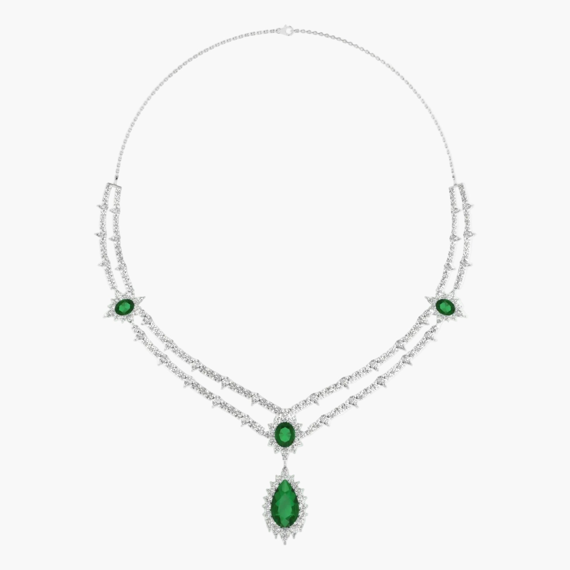 Elegant necklace with green gemstones on a white background