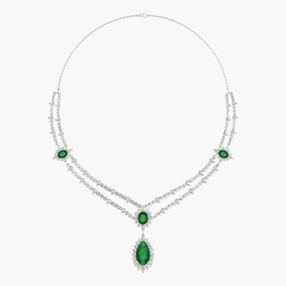 Elegant necklace with green gemstones on a white background