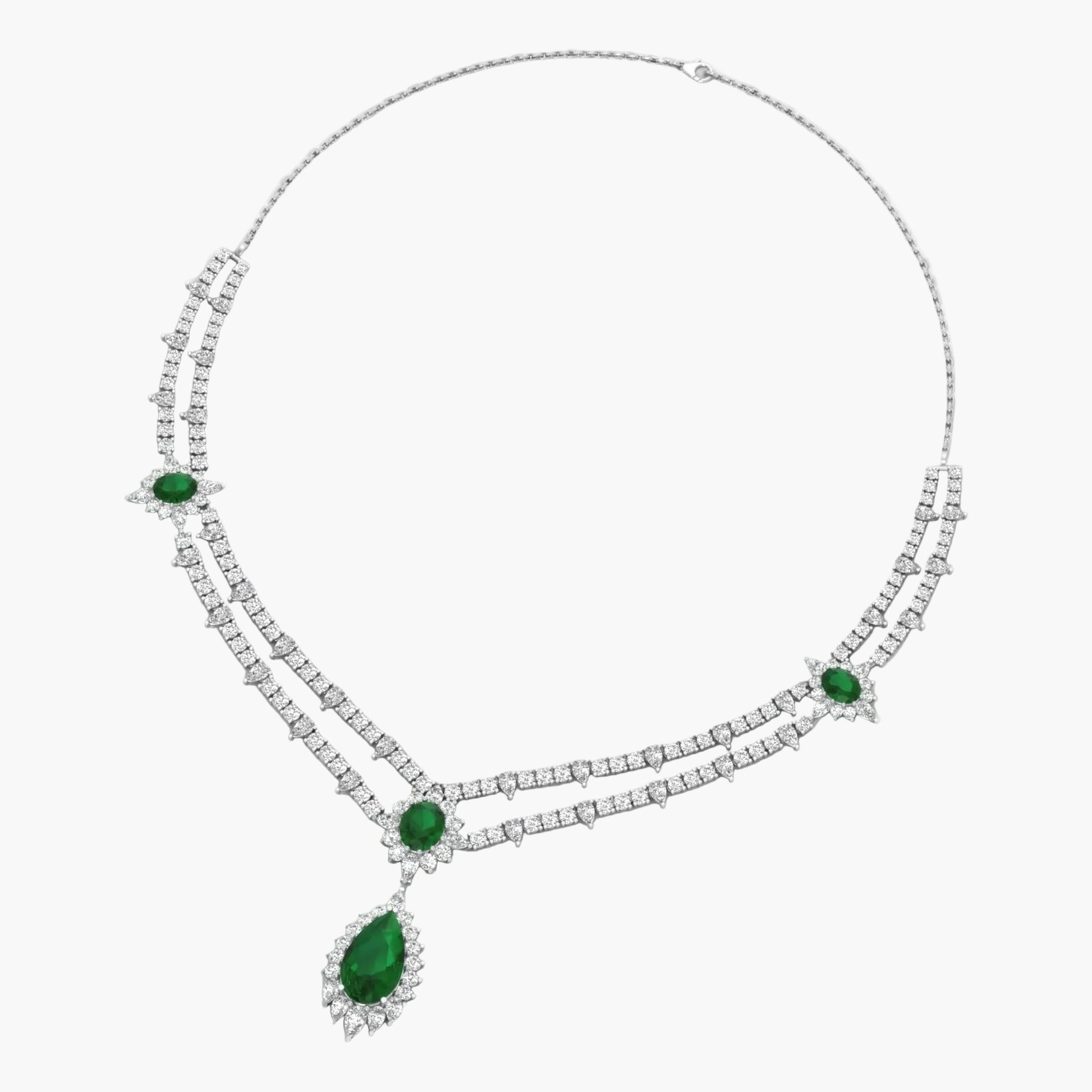 Elegant necklace with green gemstones and clear stones on a white background, branded 'Green Lab'.