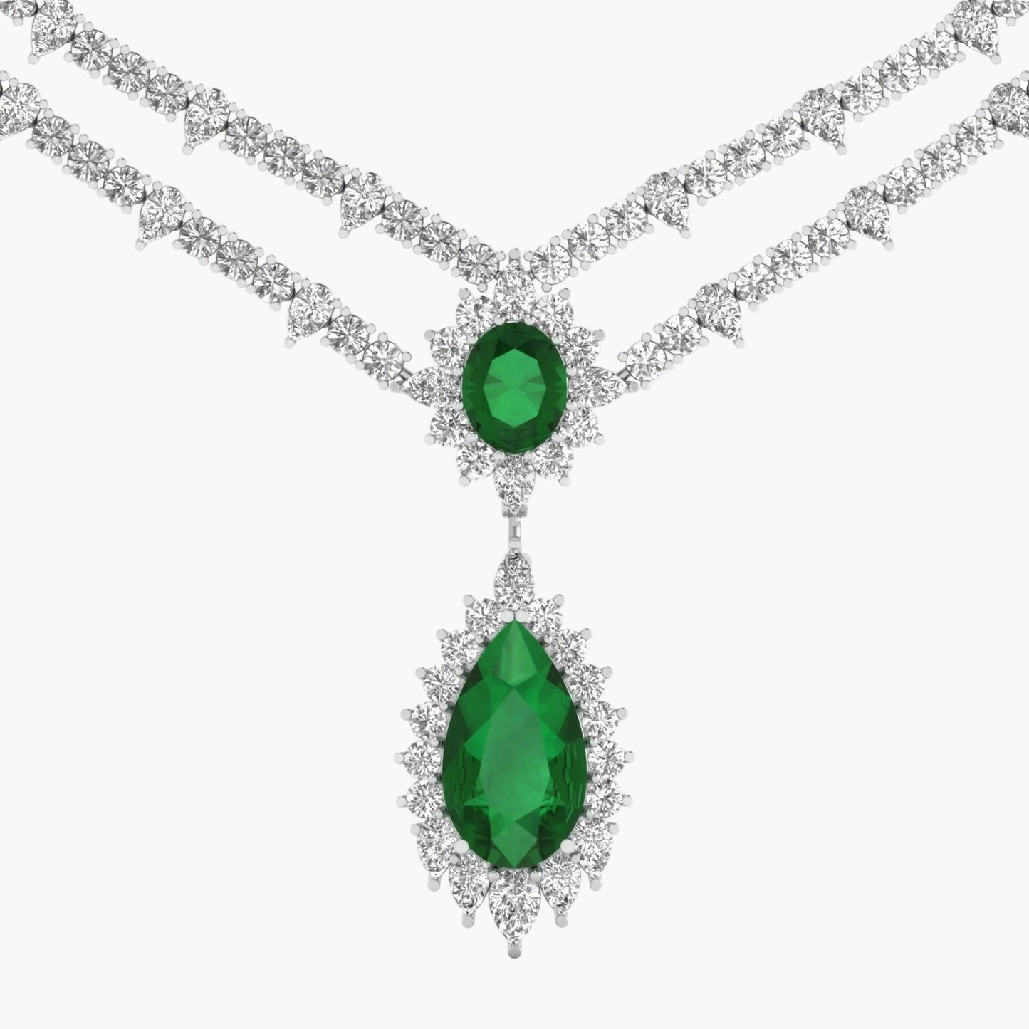 Elegant necklace with emerald green gemstones on a white background
