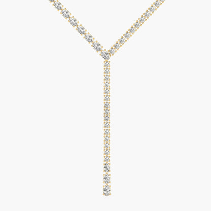 Gold necklace with diamonds on a white background