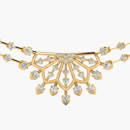 Gold necklace with diamond accents on a white background