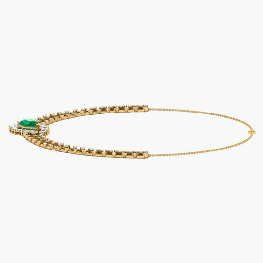 Gold necklace with a green gemstone on a white background