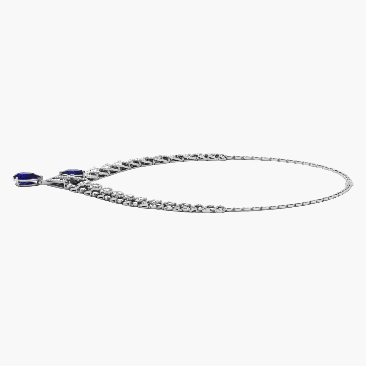 Silver bracelet with blue gemstones on a white background
