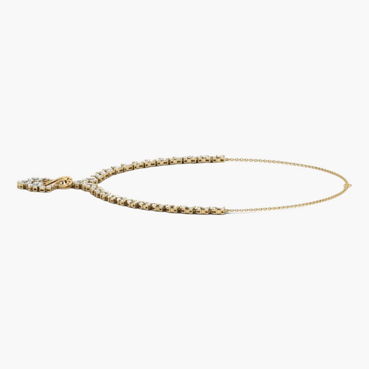 Gold bracelet on a white background