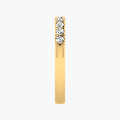 Gold earring with three diamonds on a white background