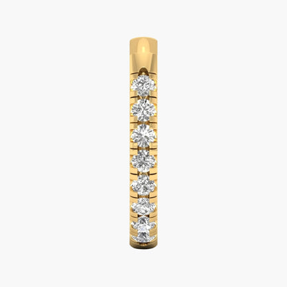Gold ring with embedded diamonds on a white background