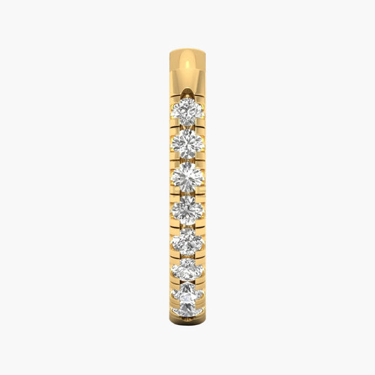 Gold ring with embedded diamonds on a white background