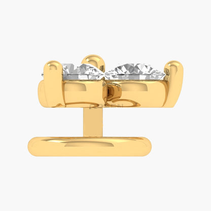 Gold earring with a clear gemstone on a white background