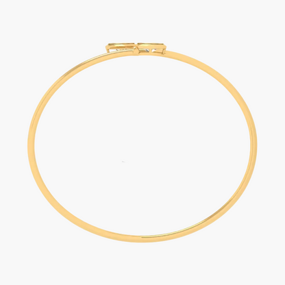 A thin gold bangle bracelet with a small rectangular clasp at the top, shown on a plain white background with a faint GREEN LAB watermark.