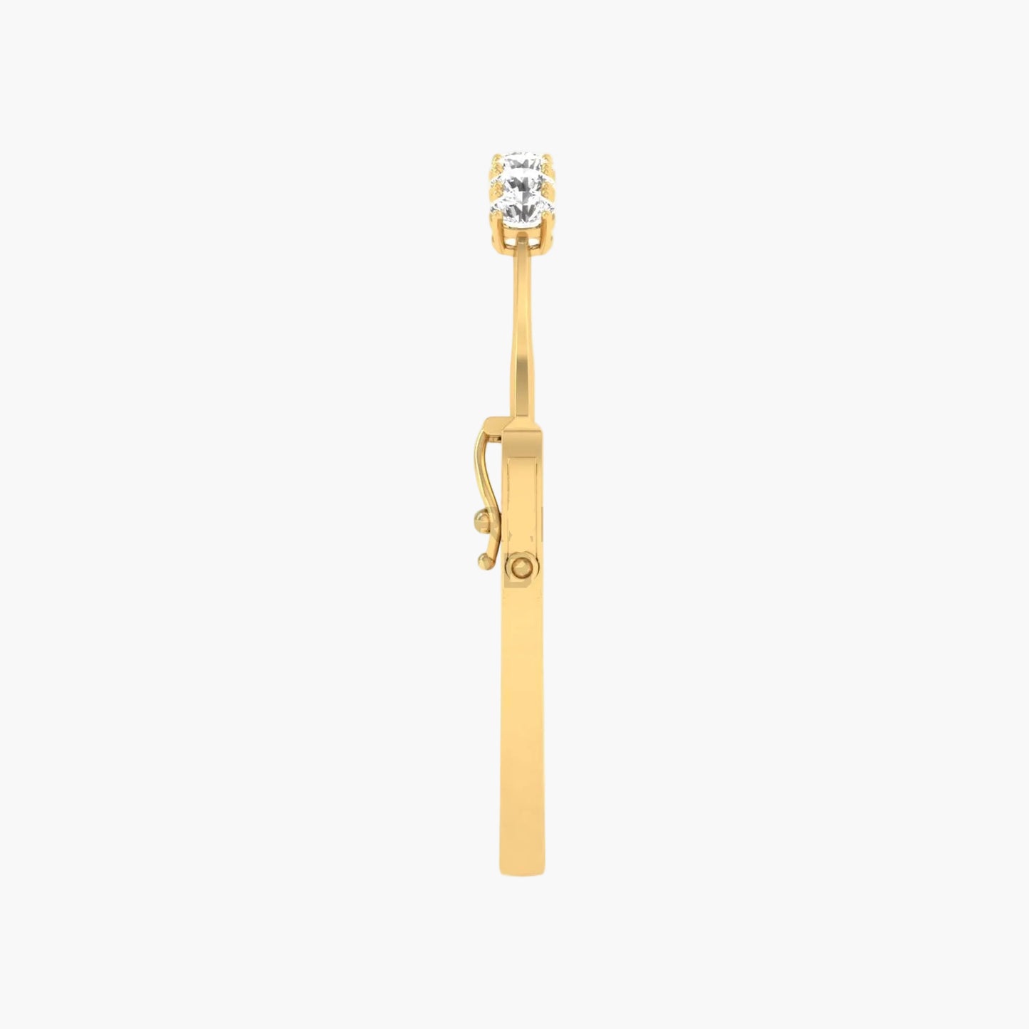 Gold earring with a clear gemstone on a white background