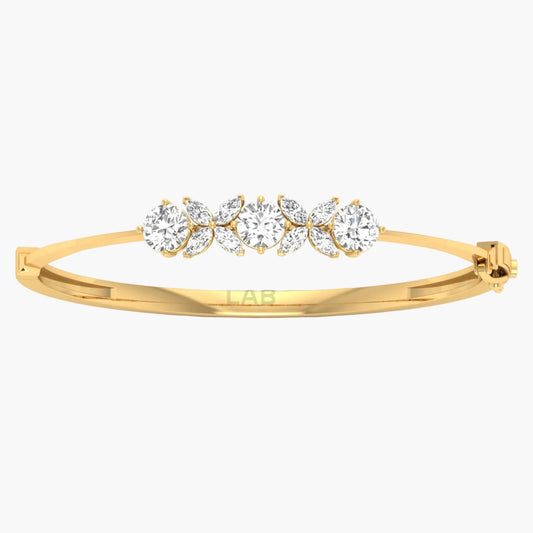 Gold bracelet with clear gemstones on a white background