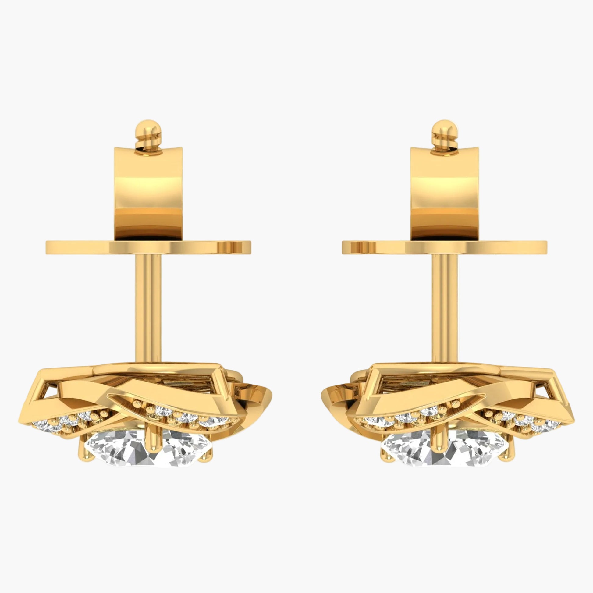 Gold earrings with clear gemstones on a white background