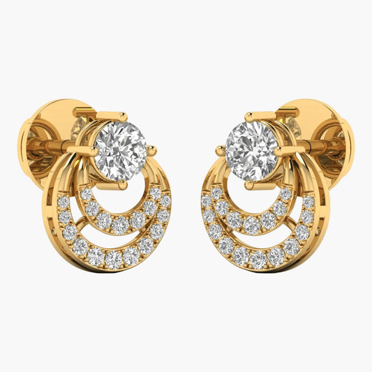 Gold earrings with clear gemstones on a white background