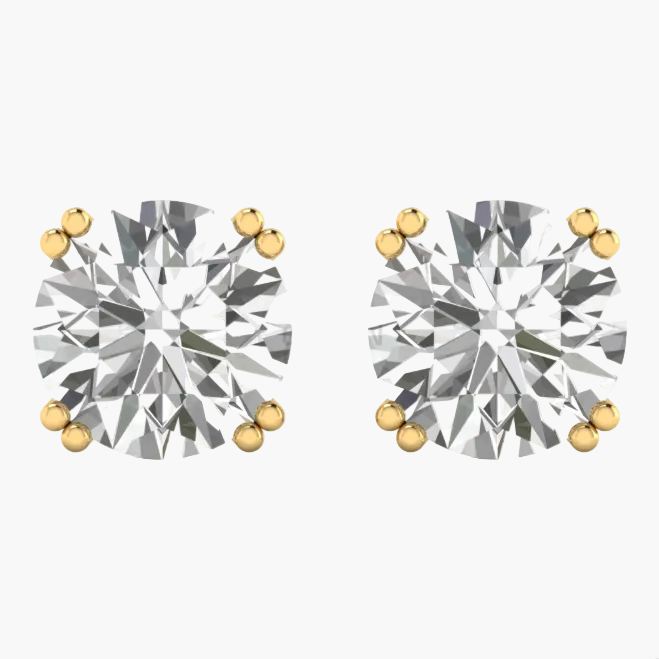 A pair of round-cut diamond stud earrings in yellow gold prong settings, shown on a plain white background with a faint GREENE LAB watermark.