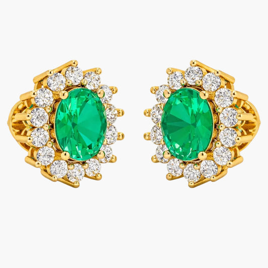 Gold earrings with green gemstones and clear stones on a white background