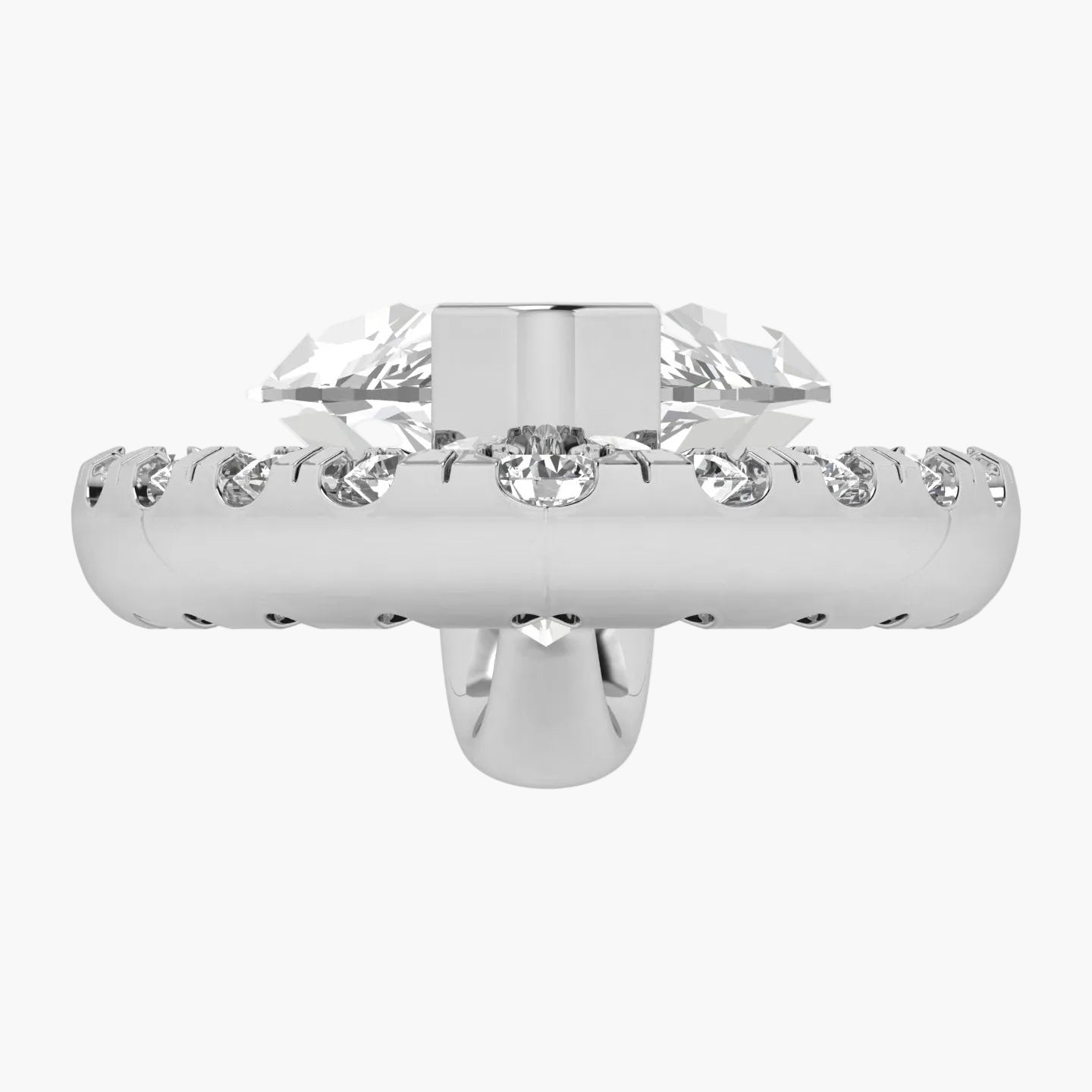 Silver ring with clear gemstones on a white background