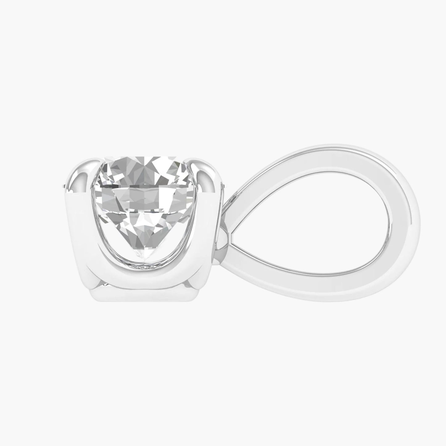 Silver ring with a clear gemstone on a white background
