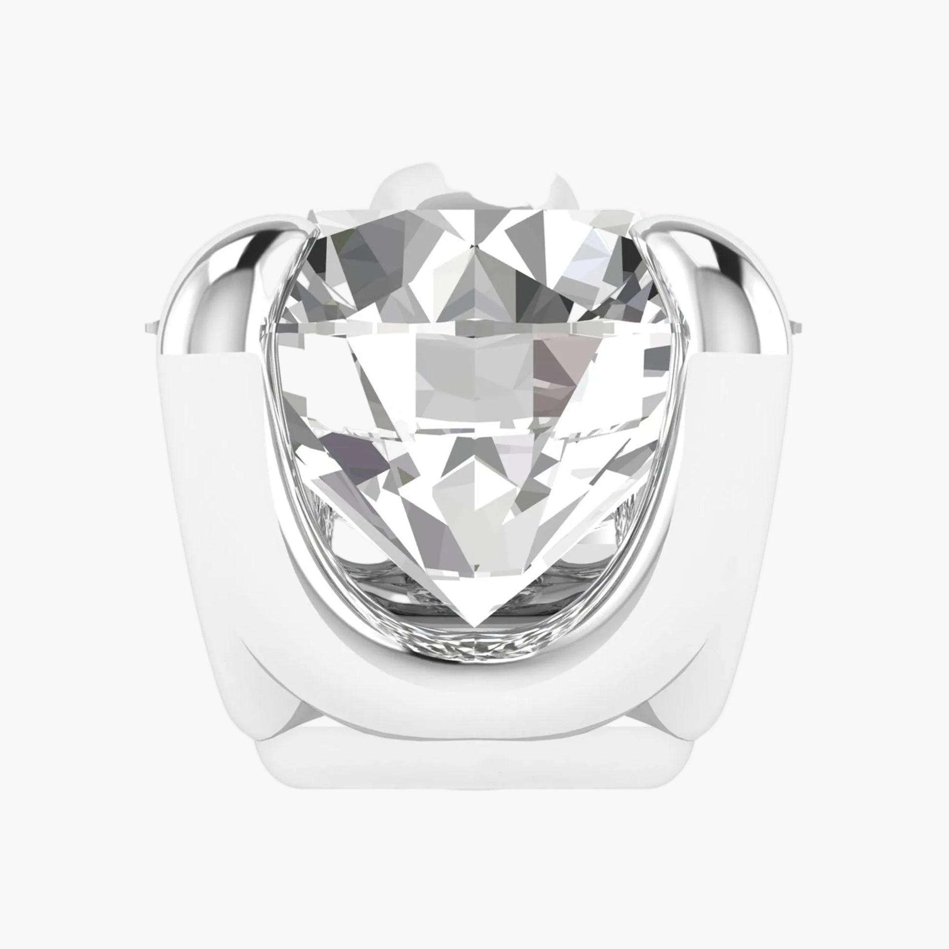 Silver ring with a large clear gemstone on a white background