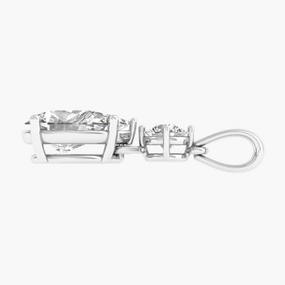Silver pendant with two clear gemstones on a white background