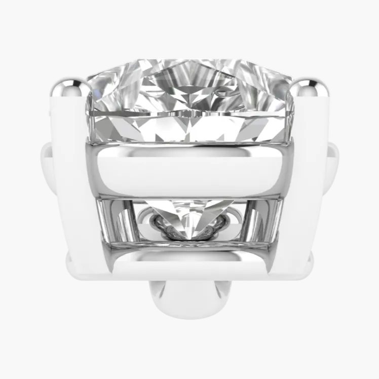 Silver ring with a large clear gemstone on a white background