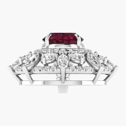 Elegant ring with a red gemstone and diamond accents on a white background