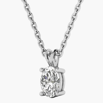 Diamond pendant on a chain against a white background