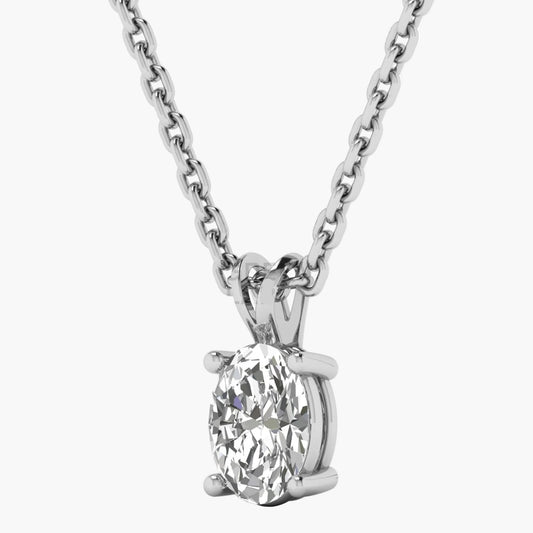 Diamond pendant on a chain against a white background