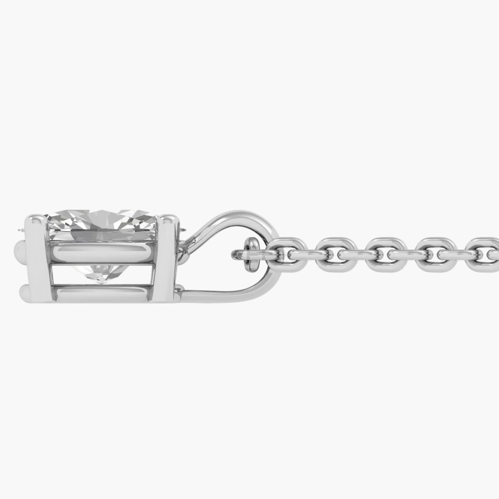 Diamond ring with chain on a white background, featuring 'GIA' on the band.