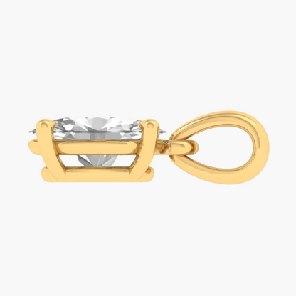 Gold pendant with a clear gemstone on a white background