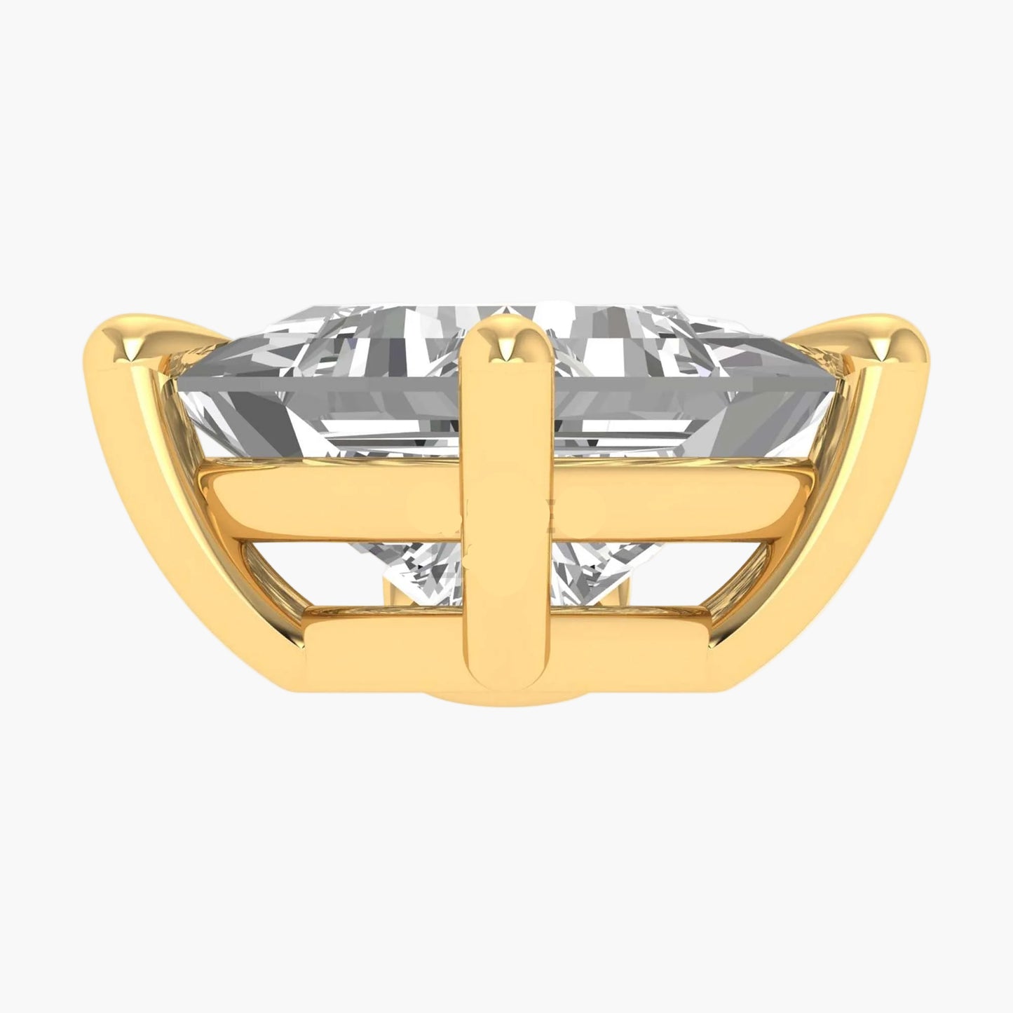Gold ring with a large clear gemstone on a white background