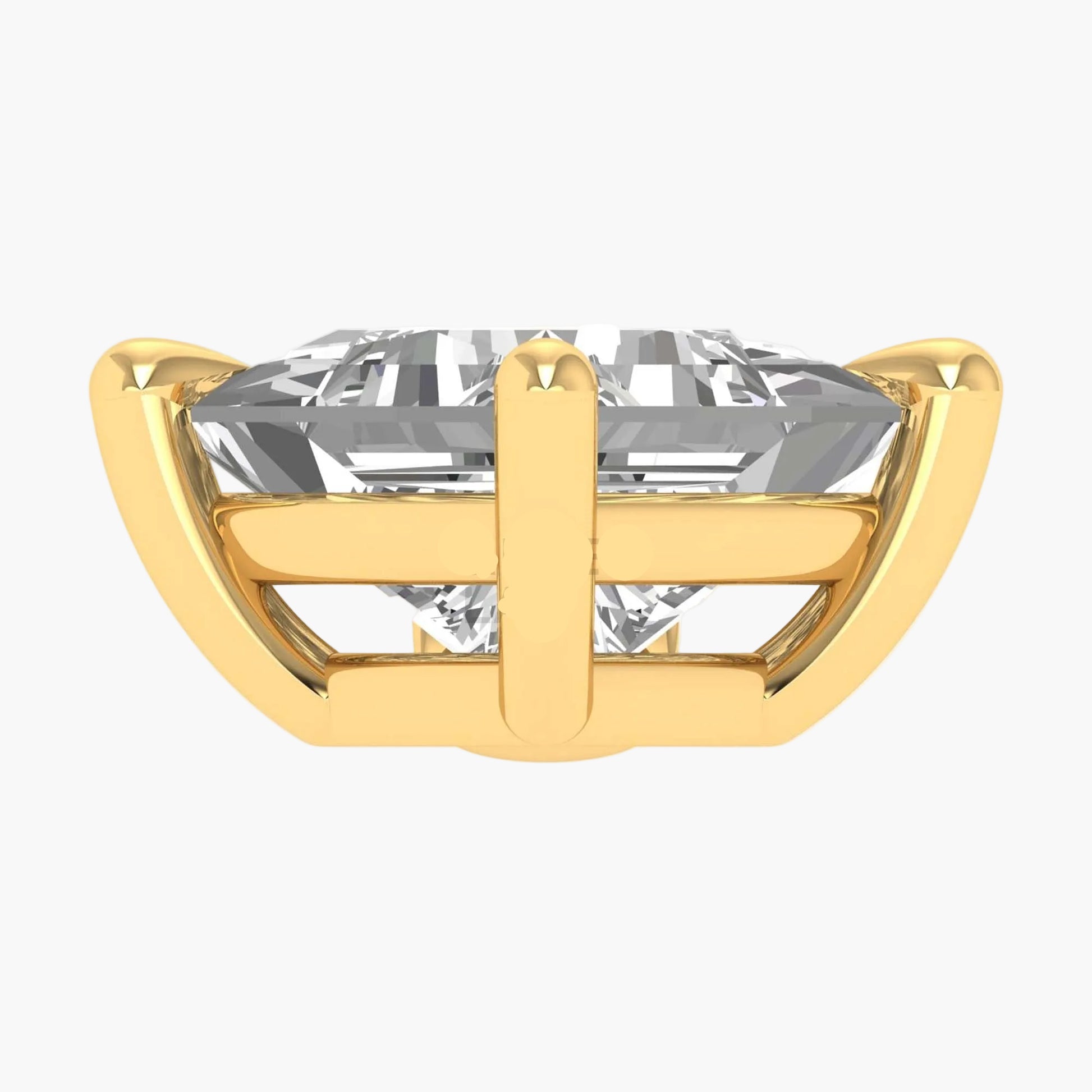 Gold ring with a large clear gemstone on a white background