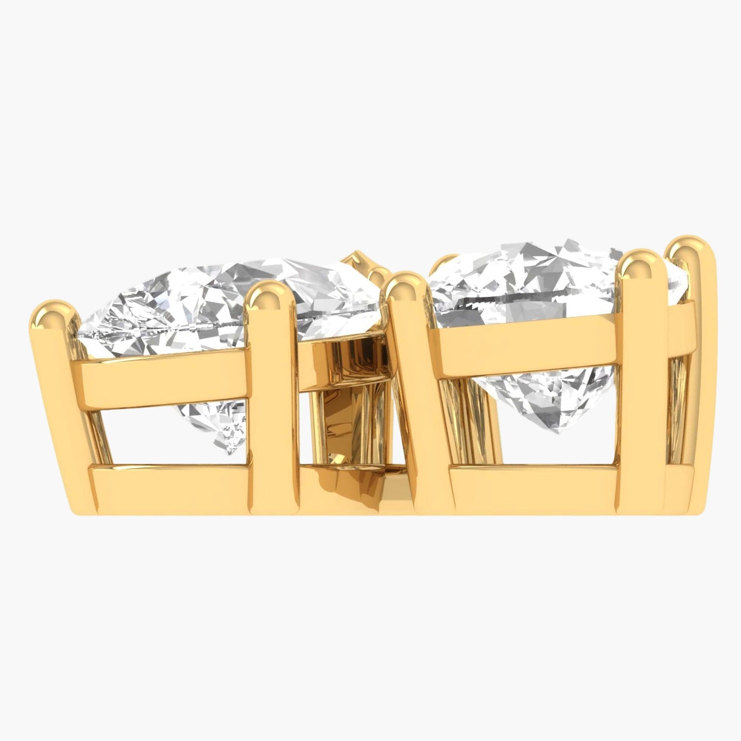 Gold earrings with clear gemstones on a white background