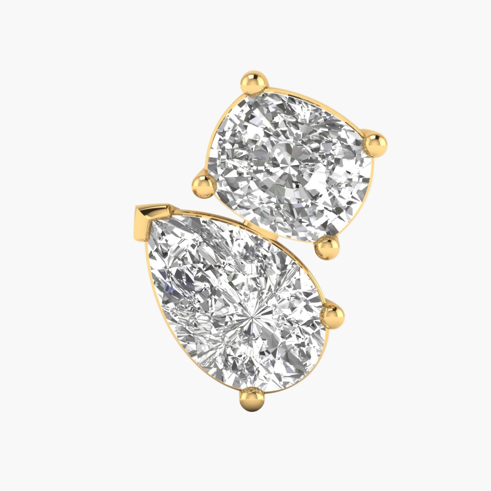 Gold earrings with pear-shaped and round clear gemstones on a white background