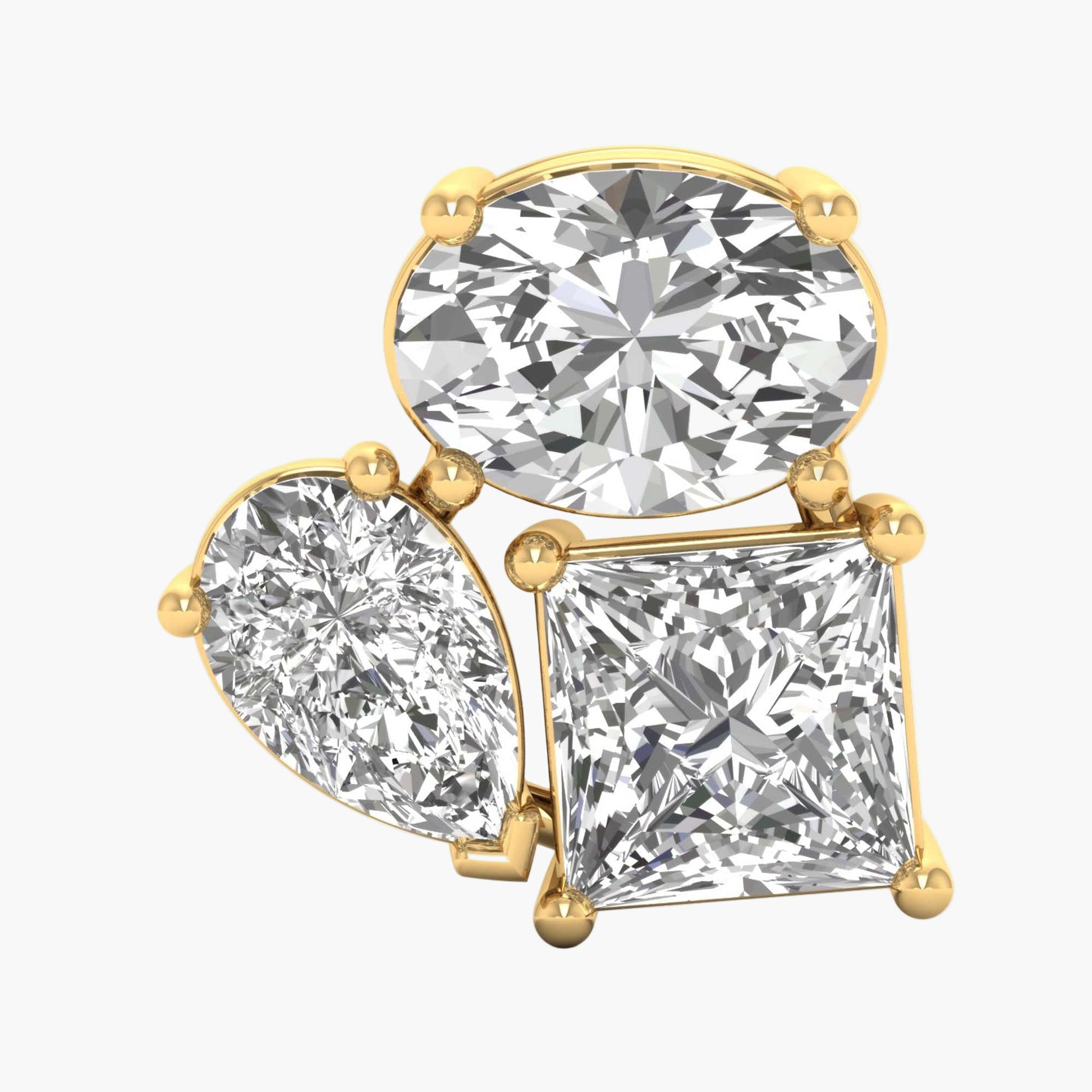 Gold earring with three clear gemstones on a white background