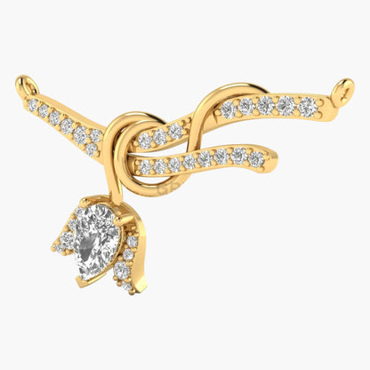 Gold necklace with a knot design and heart-shaped gemstone on a white background