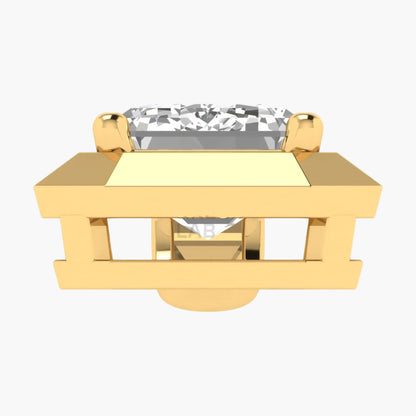 Gold pendant with a clear gemstone on a white background