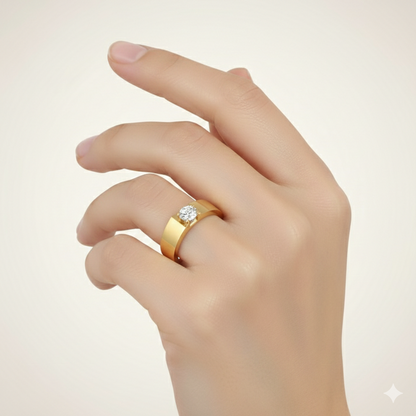 Gold ring with a diamond on a hand against a light background