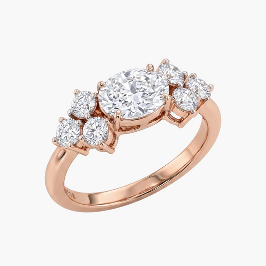 Rose gold ring with multiple diamonds on a white background
