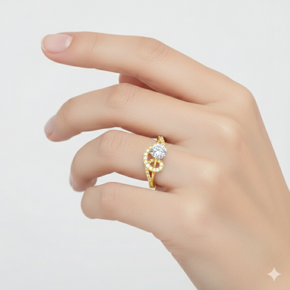 Gold ring with a diamond on a hand against a light gray background