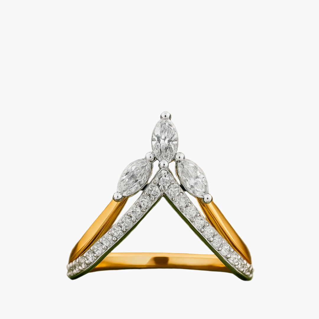 Gold and silver ring with diamond accents on a white background