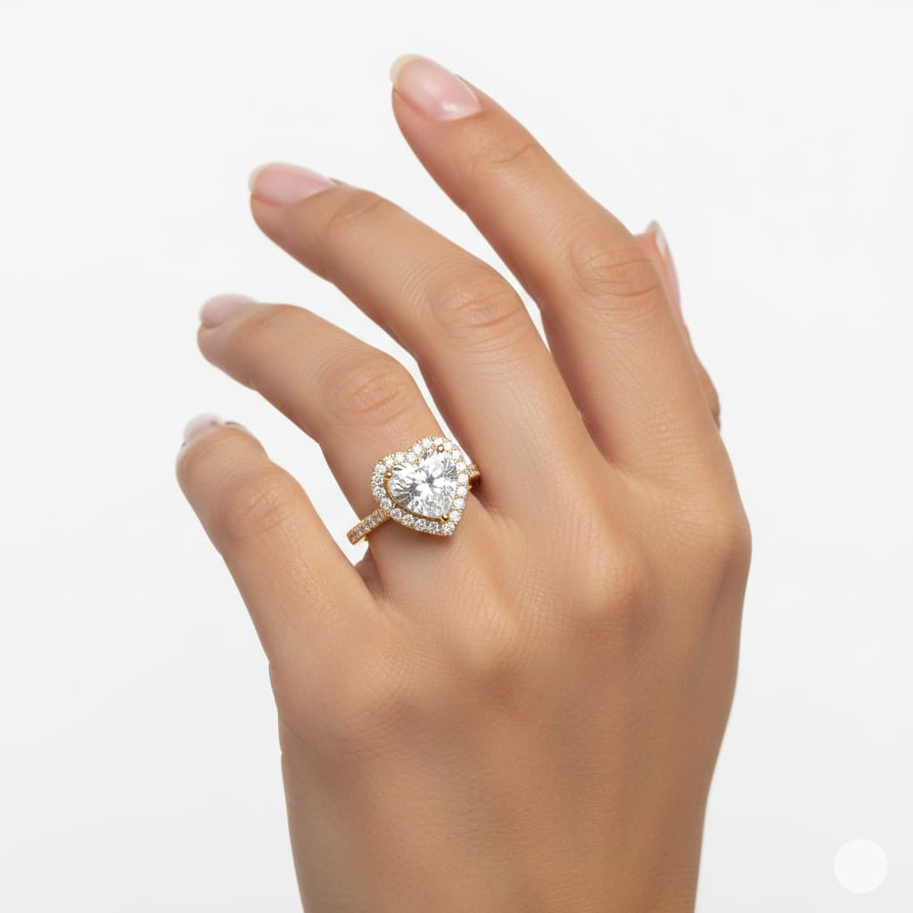 Hand wearing a diamond ring on a white background