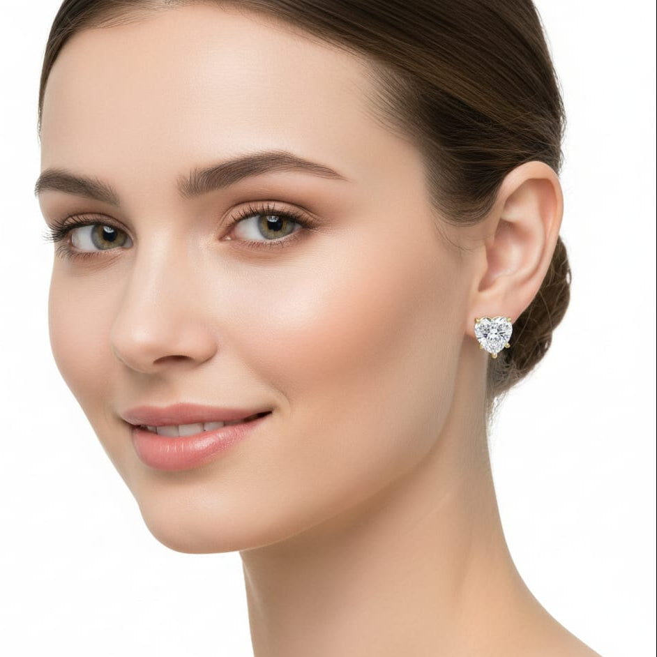 Woman wearing a diamond earring on a white background