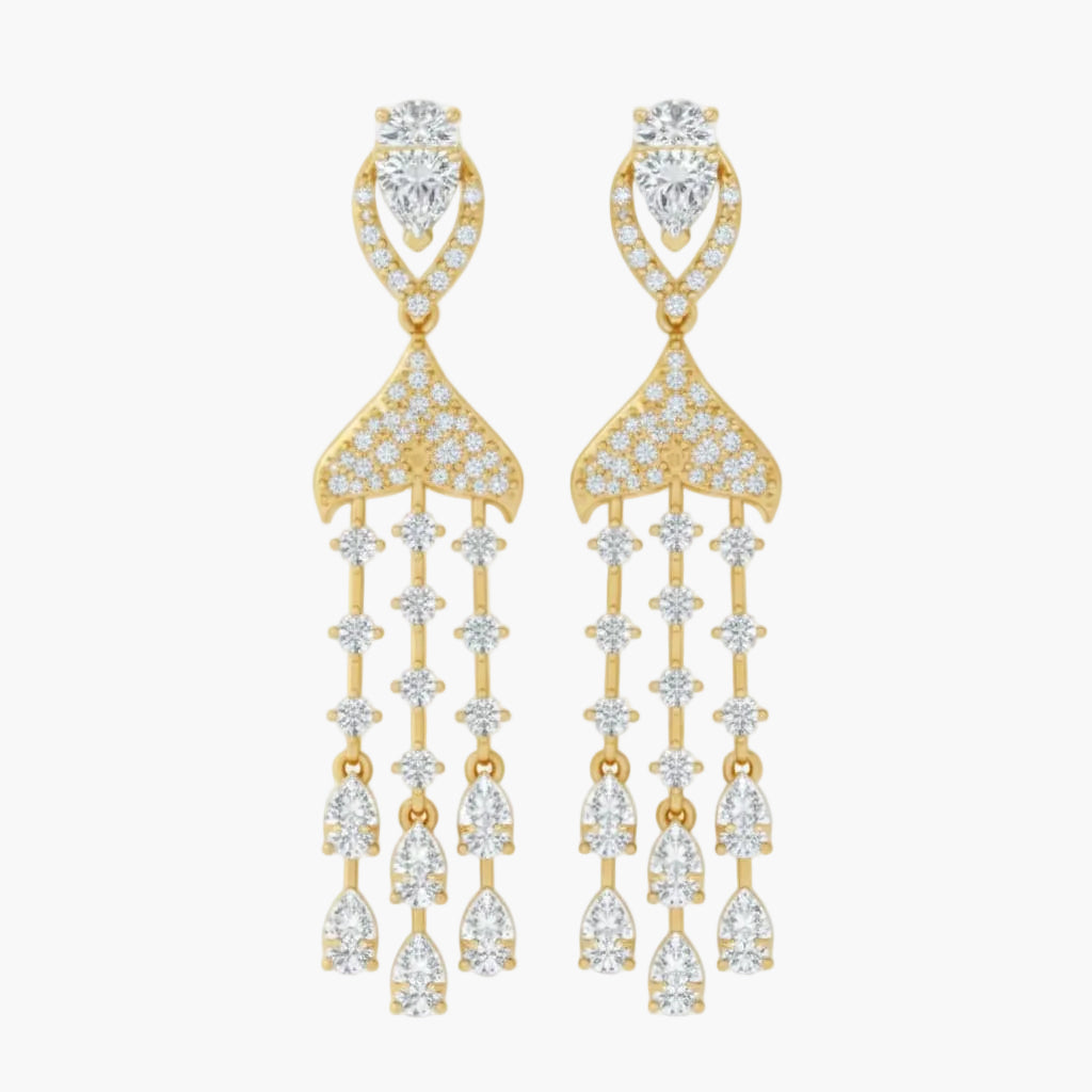 Gold and diamond earrings on a white background