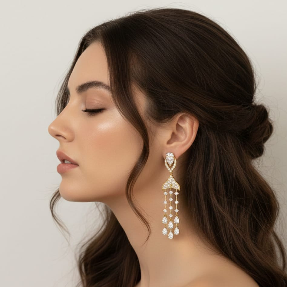 Woman wearing a diamond earring with a plain background