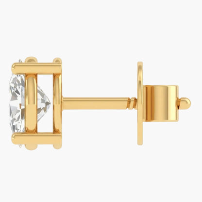 Gold earring with a clear gemstone on a white background
