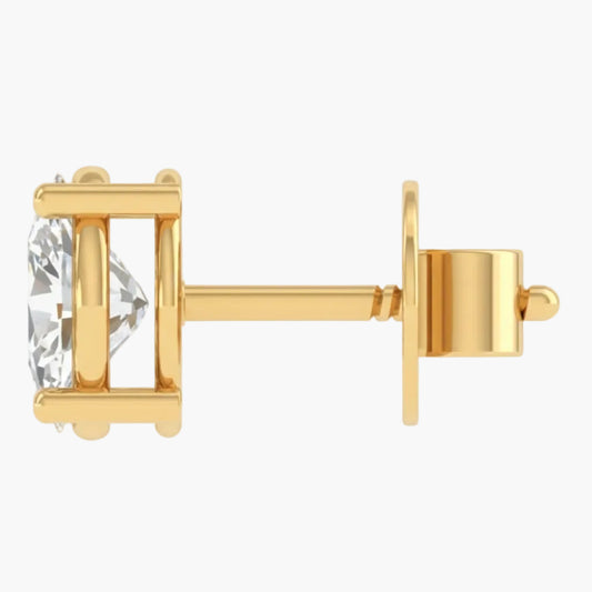 Gold earring with a clear gemstone on a white background